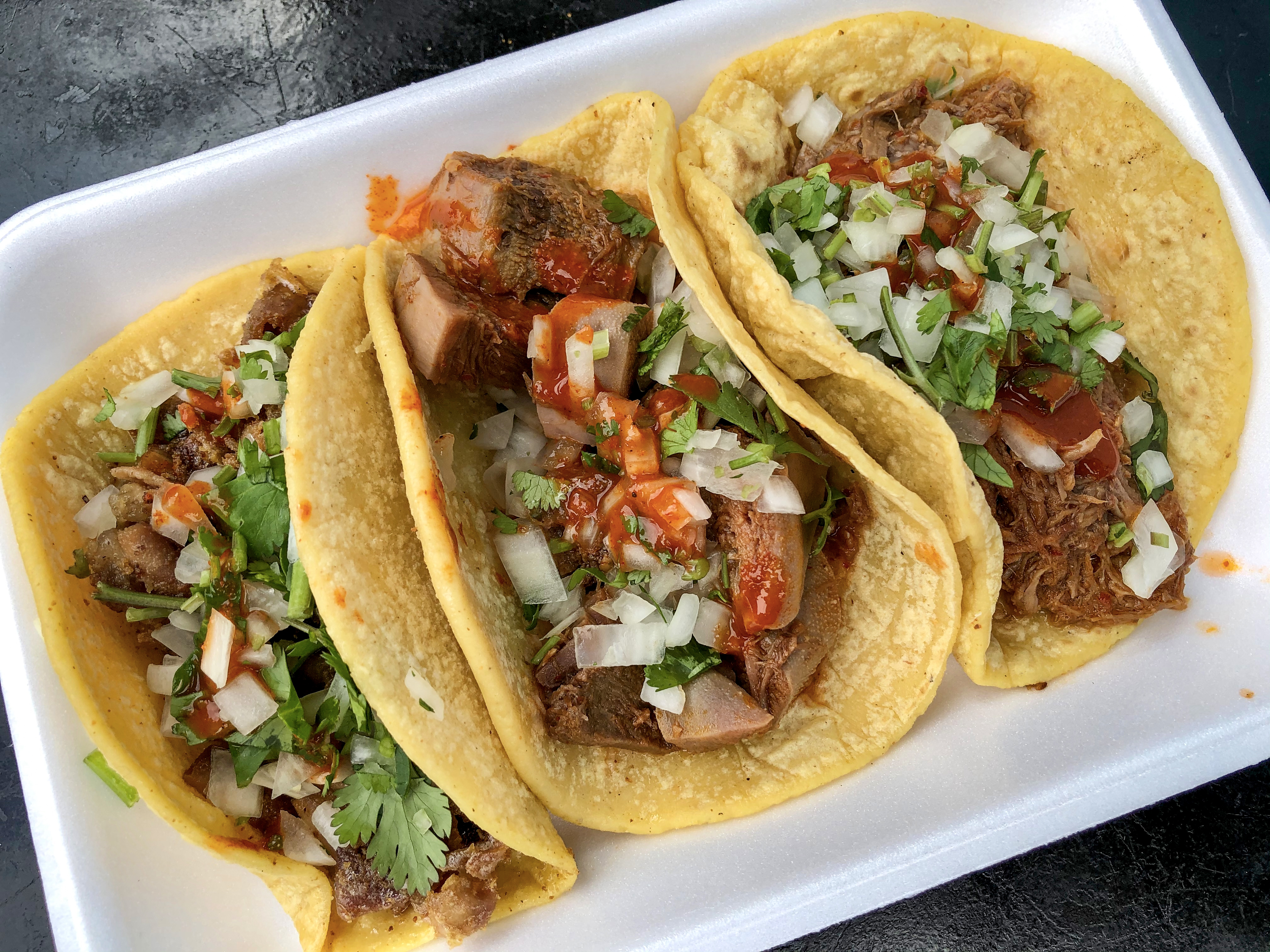 Tripa, tongue and birria tacos from La Fachada